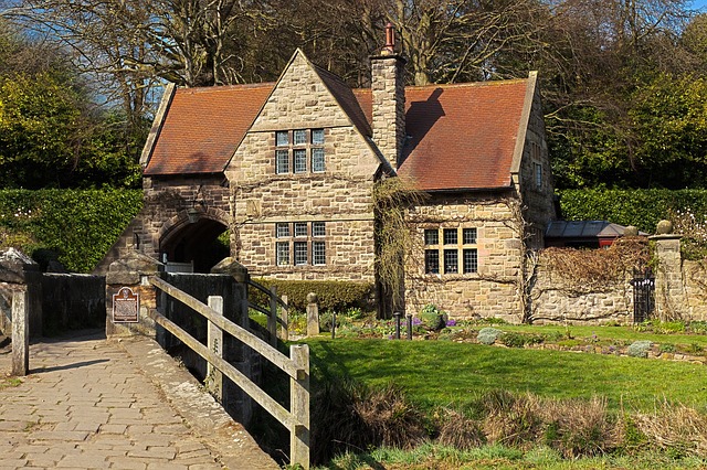 Old House in England with grass at the front